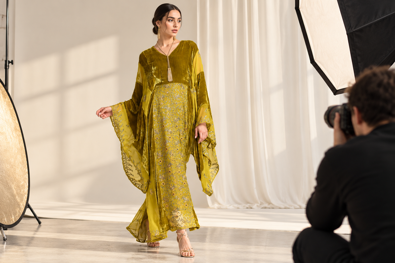 Model in the olive velvet kaftan